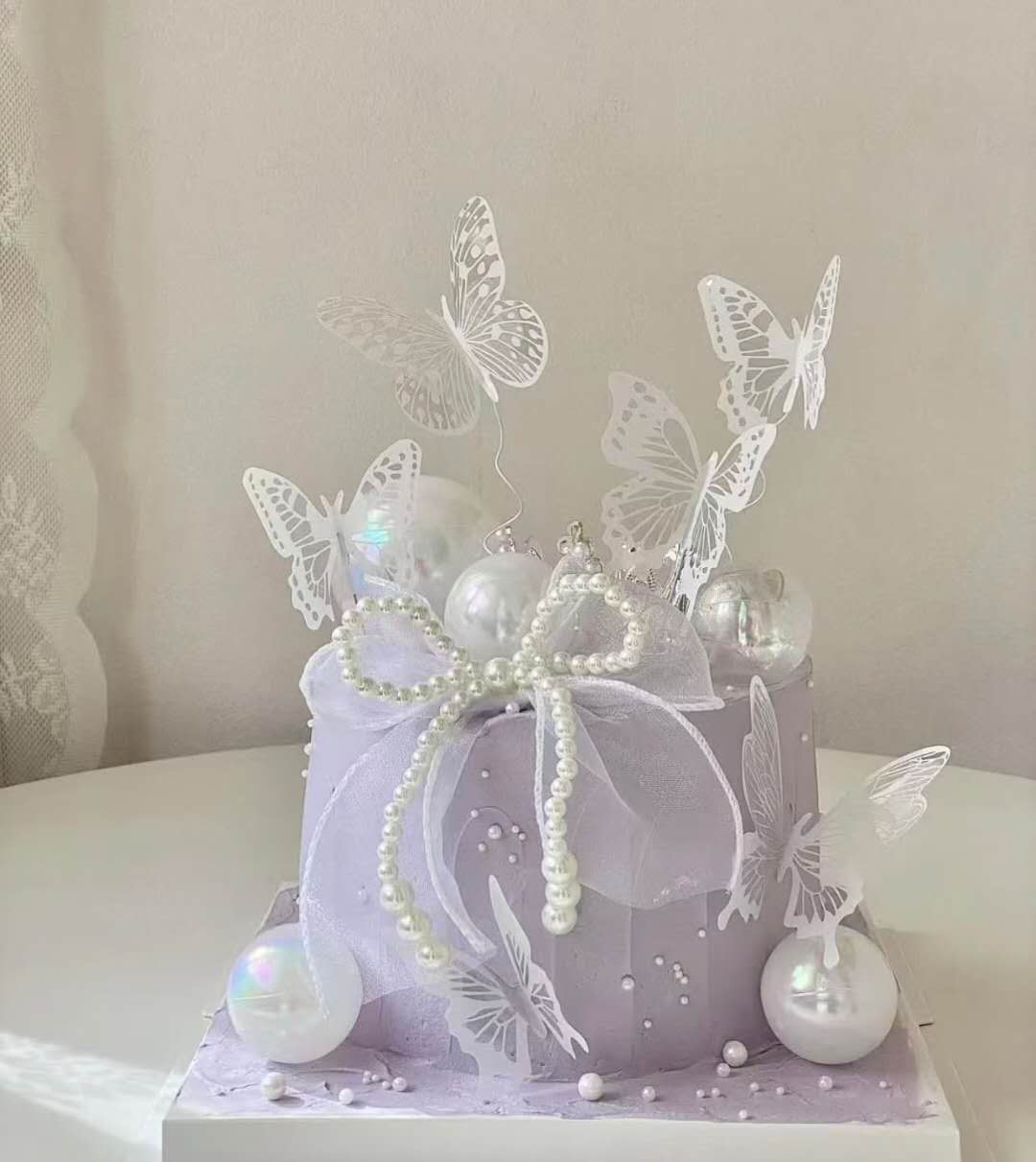 女士紫色蝴蝶蛋糕 Women's lavender butterfly cake